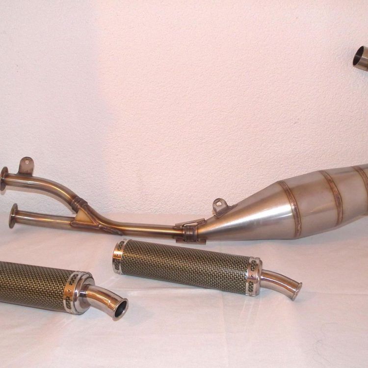 CONJUNTO DE ESCAPE DOBLE SILENCIOSO JIM LOMAS RS125