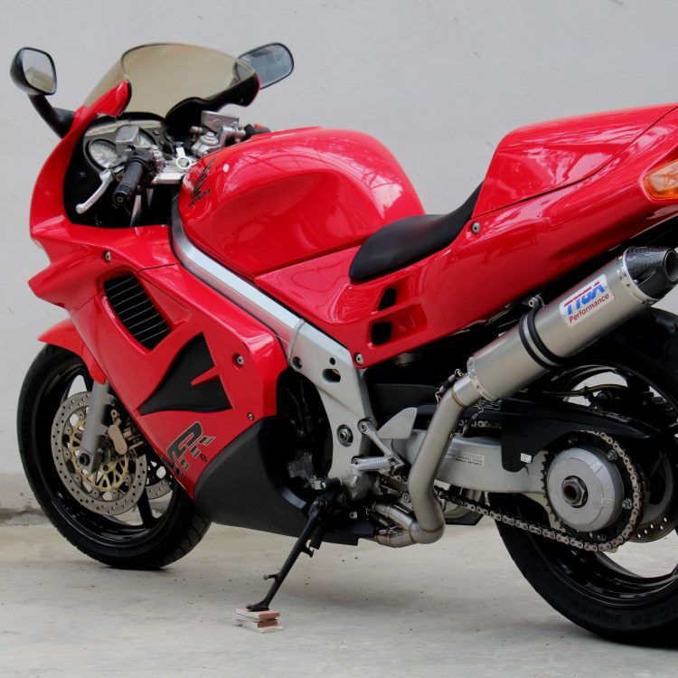 Conjunto de silenciador con sistema de carrera completo, tapa de extremo redonda de acero inoxidable/carbono, salida izquierda, VFR750F gen 4, 94-97